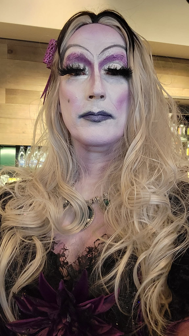 Maggie in full drag at a community event